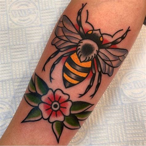 american traditional bee tattoo.